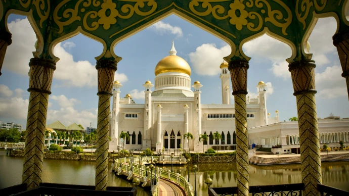 a large white building with a gold dome